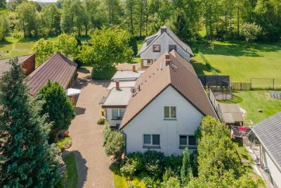 Einfamilienhaus, zwei Wohnungen und fantastisches Grundstück in Kolkwitz OT Babow - Am Kanal!