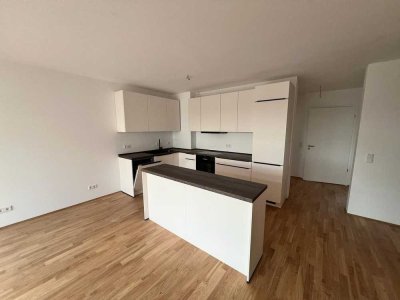 Erstbezug: Exclusive 3-Zimmer Neubau mit EBK und Stellplatz