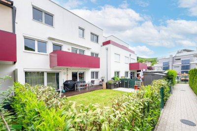 Neuwertige Gartenwohnung mit Terrasse und 2 Garagenplätze