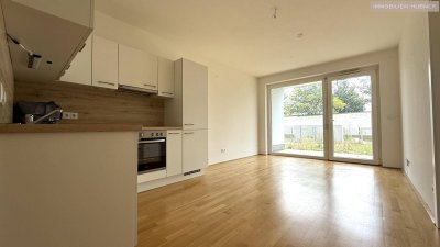 Moderne Neubauwohnung mit EIGENGARTEN und TERRASSE nahe Akademiepark