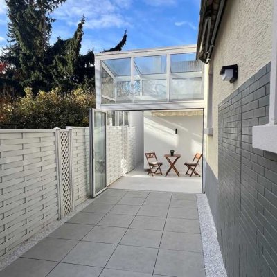 Modernisiert: EG-Wohnung mit Wintergarten, Süd-Terrasse & neuer Technik!