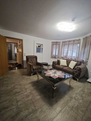 Charmante 3-Zimmer-Hochparterrewohnung mit Balkon, Garten & Garage
