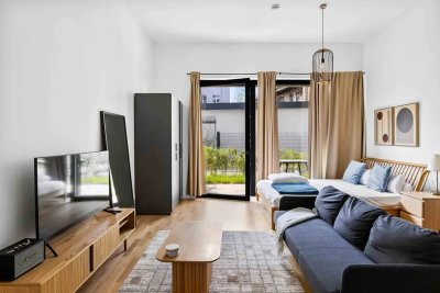 Helle Studio Gartenwohnung voll möbliert und einzugsbereit