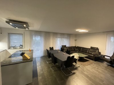 Exklusive 3-Zimmer-Erdgeschosswohnung mit 2 Extra Zimmer im UG und Garten